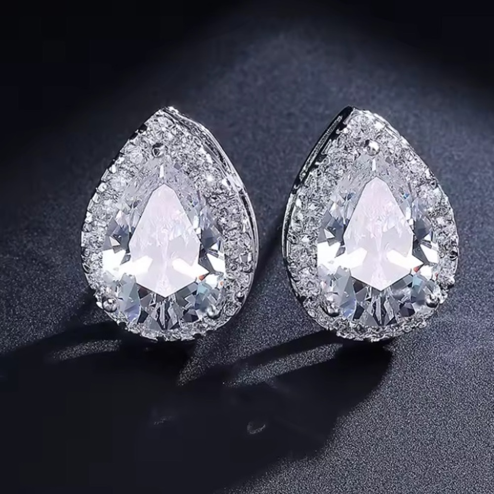9.25 Sterling Silver Teardrop Moissanite Stud Earrings - Sparkling Silver Tone